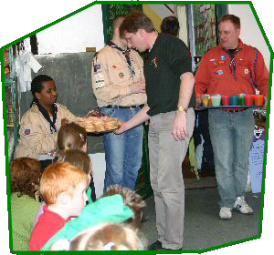 Uitdelen van beschuit met muisjes